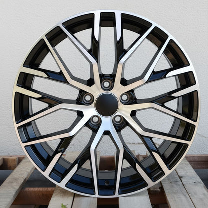 AU1 22x9.5 5x112 +26 66.6 Black Machined Face