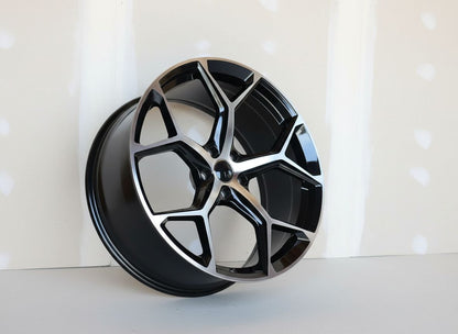 AU16 21x9 5x112 +26 66.6 Black Machined Face
