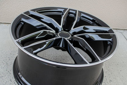 AU3 20X9 5X112 +32 66.6 Black Machined Face
