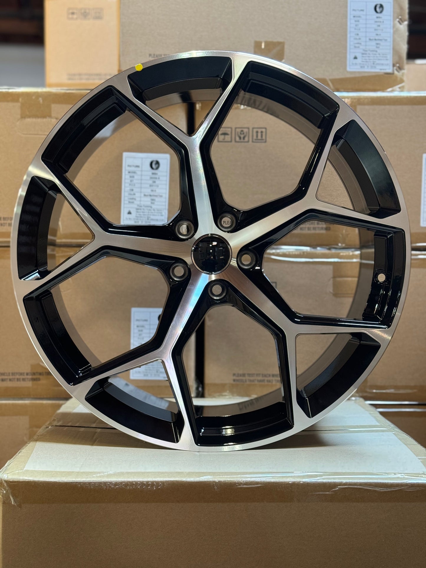 AU16 20x9 5x112 +30 66.6 Black Machined Face